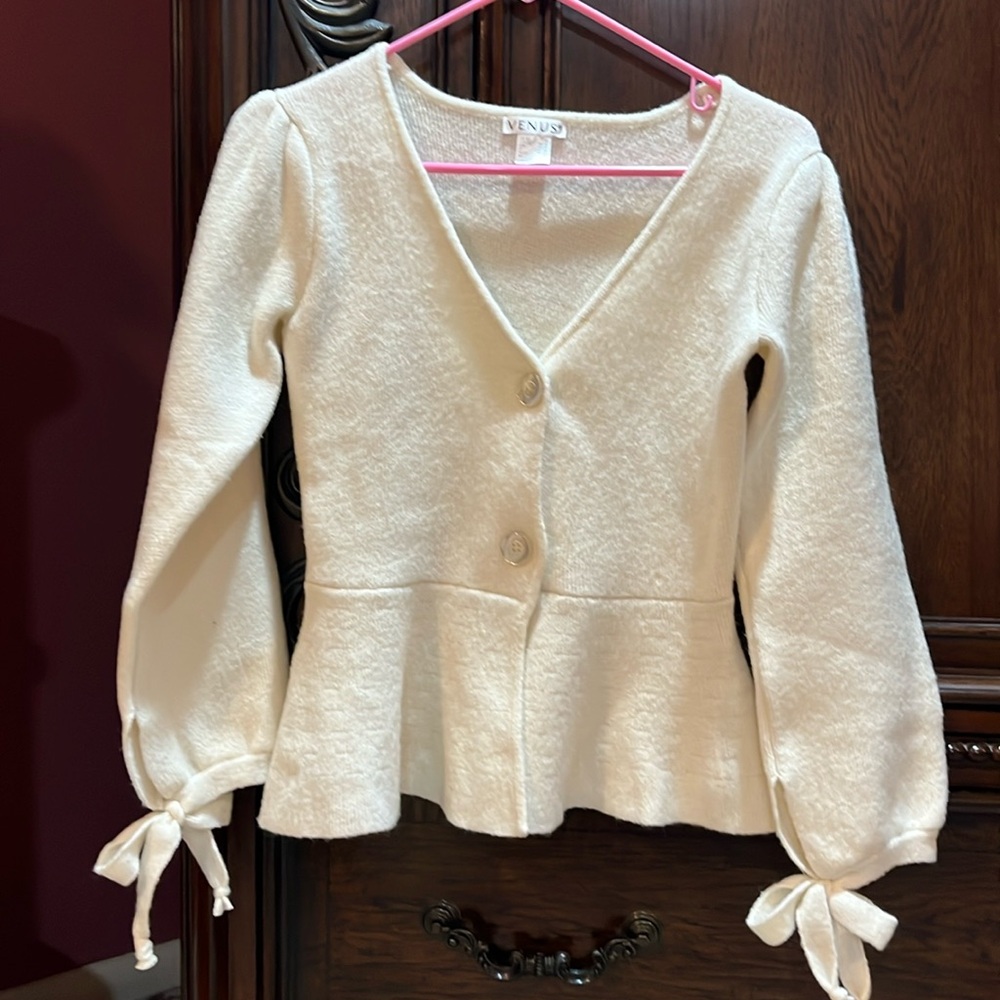 Venus cream peplum sweater. Size M